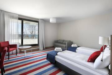 Фото номера Семейный номер с видом на море Отель Hotel Skipper г. Рева 4